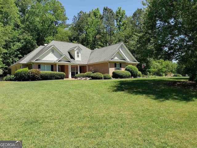 view of front of property with a front lawn