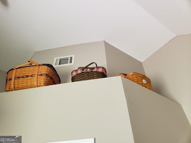 bedroom with vaulted ceiling