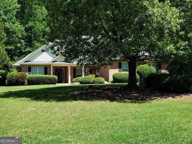 view of front of house with a front yard