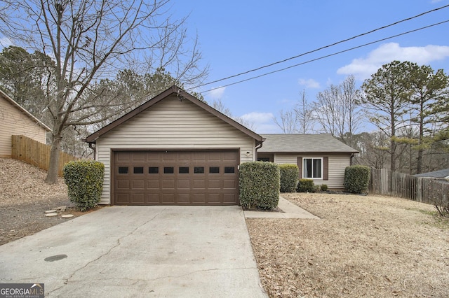 ranch-style house featuring a garage