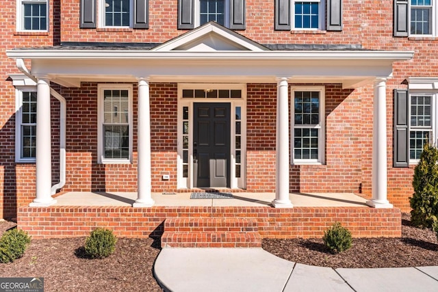 property entrance with a porch