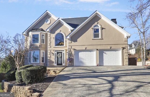 front of property with a garage