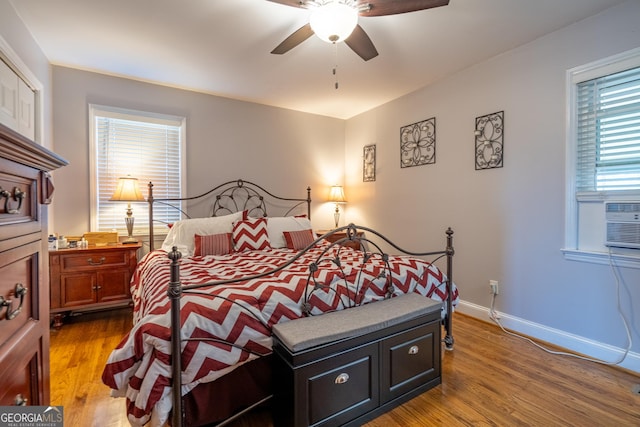 bedroom featuring hardwood / wood-style flooring and ceiling fan