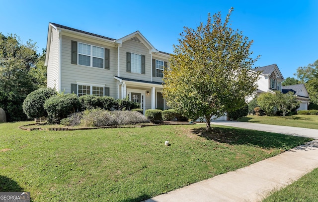 view of front of home featuring a front yard