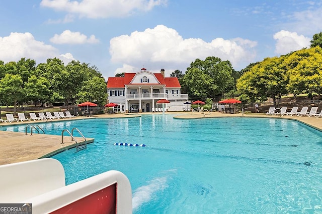 view of pool featuring a patio area