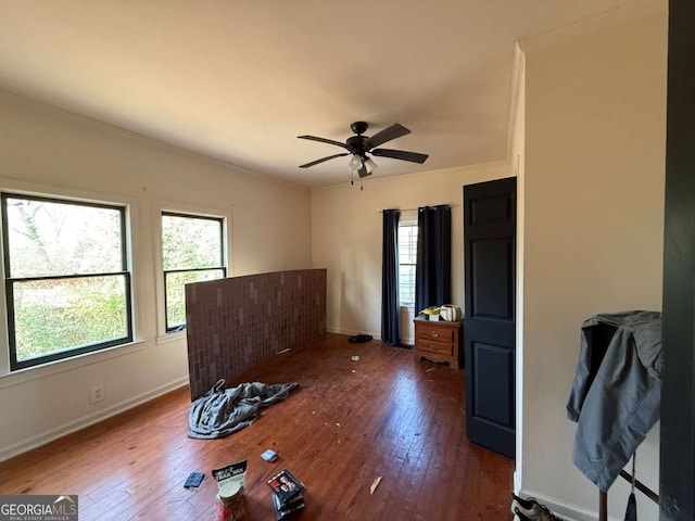 interior space with dark hardwood / wood-style floors and ceiling fan