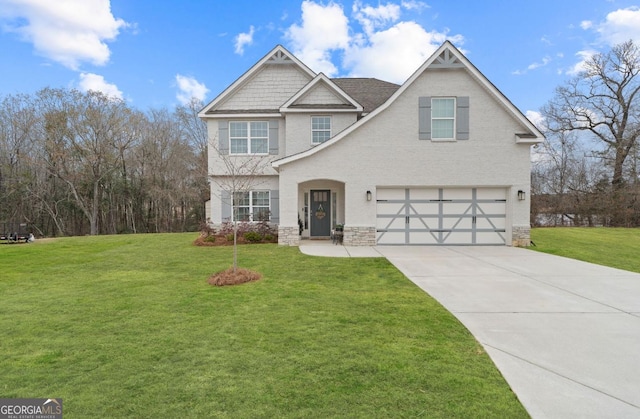 view of front facade with a garage and a front lawn