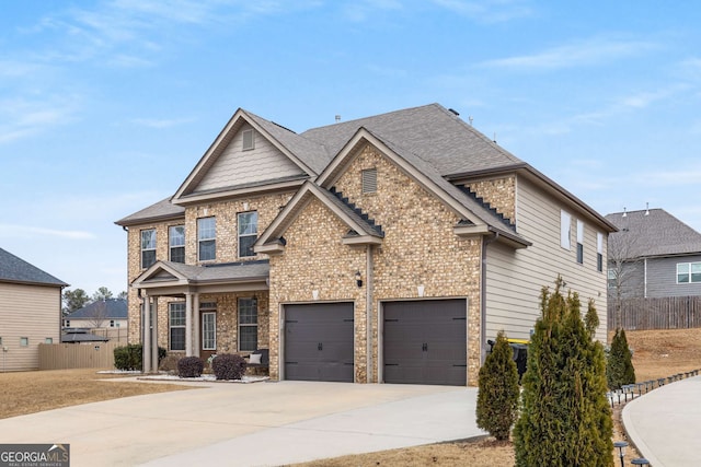 craftsman inspired home with a garage