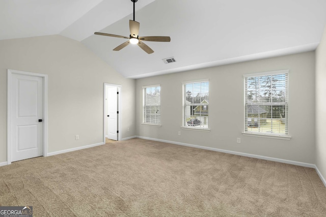 interior space featuring ceiling fan and lofted ceiling