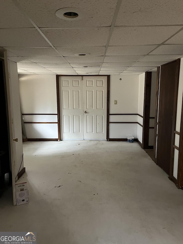 interior space featuring a paneled ceiling