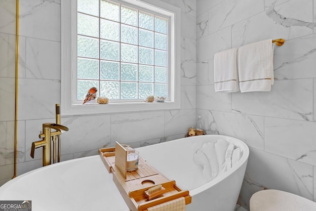 bathroom featuring a tub