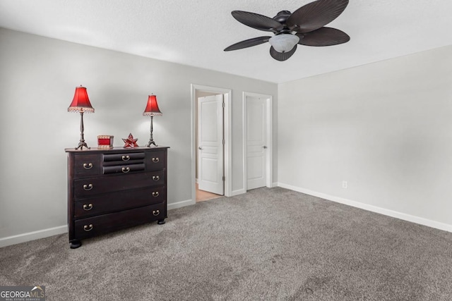 bedroom with light colored carpet, a textured ceiling, and ceiling fan