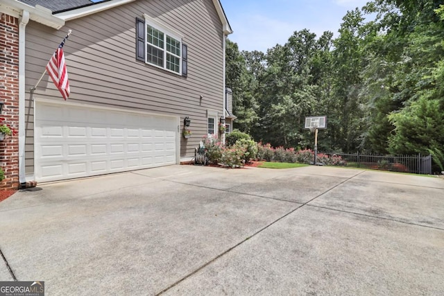 view of property exterior featuring a garage