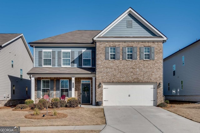 craftsman inspired home featuring a porch and a garage