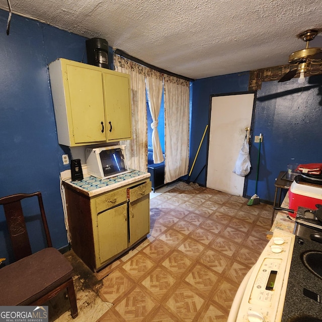 kitchen featuring a textured ceiling