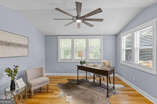 empty room with light wood-type flooring, a textured ceiling, and ceiling fan