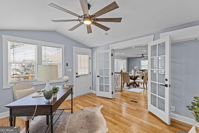 empty room with ceiling fan, hardwood / wood-style floors, and a textured ceiling