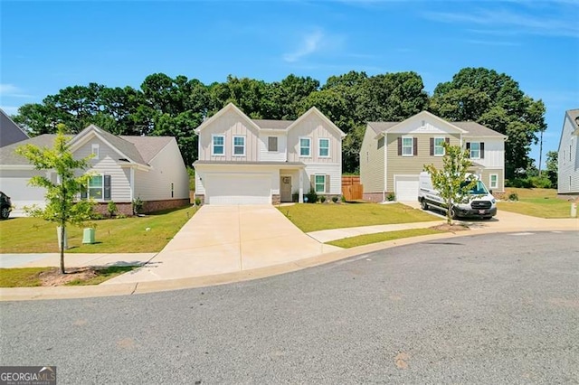 view of front of property with a garage and a front lawn