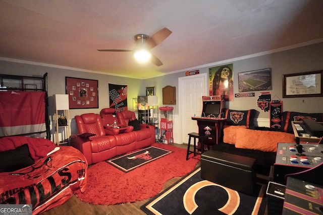 living room featuring wood-type flooring, ornamental molding, and ceiling fan