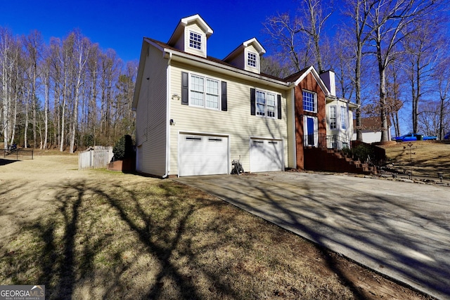 view of property exterior featuring a garage