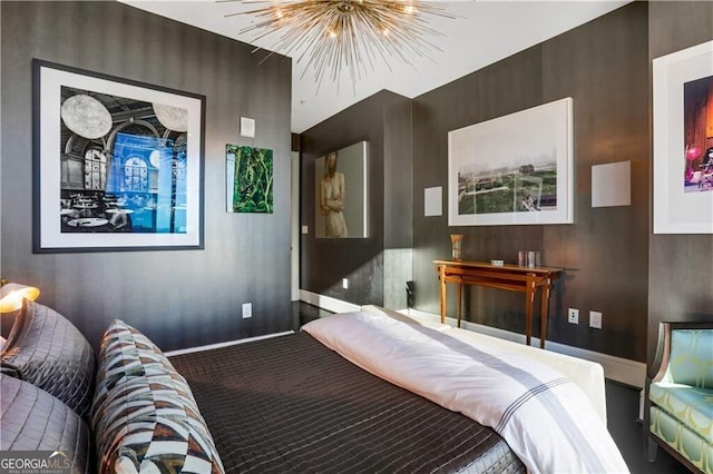 carpeted bedroom with a chandelier