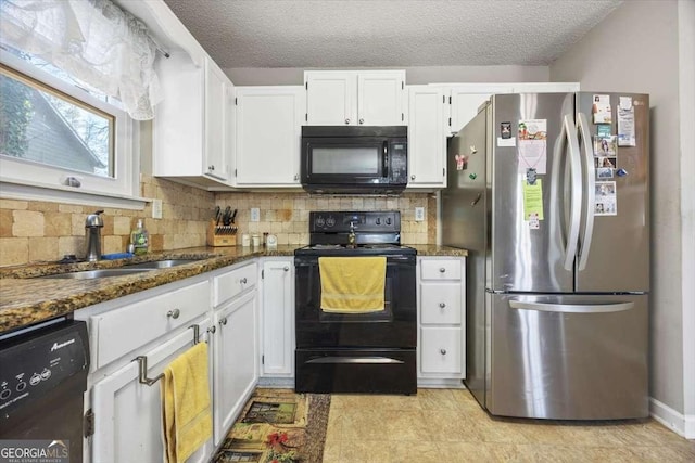 kitchen featuring white cabinetry, black appliances, a textured ceiling, and dark stone countertops