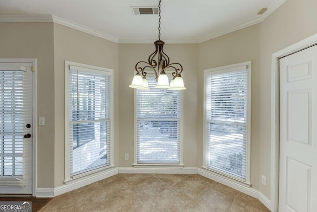 unfurnished dining area with a notable chandelier, crown molding, and plenty of natural light