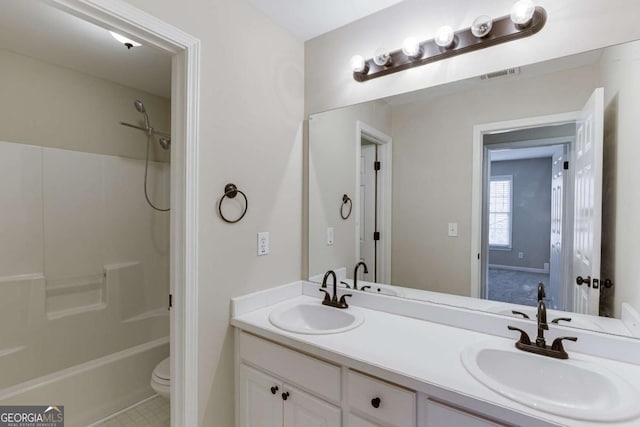 full bathroom with toilet, shower / tub combination, and vanity