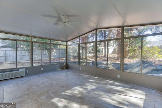 unfurnished sunroom featuring lofted ceiling and ceiling fan