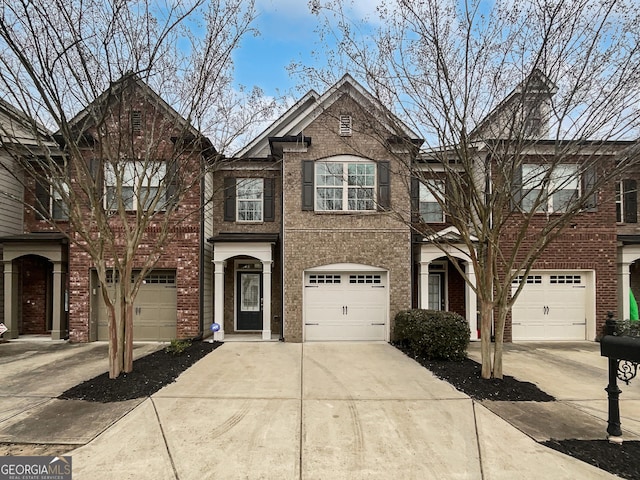 multi unit property featuring a garage