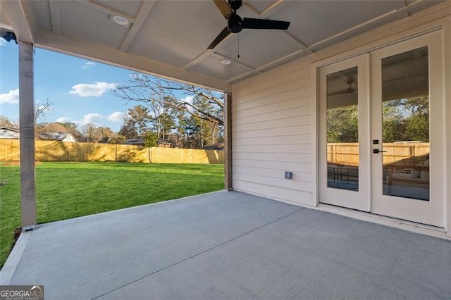 view of patio featuring ceiling fan and french doors