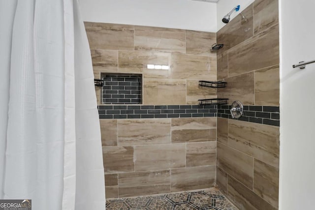 bathroom featuring walk in shower