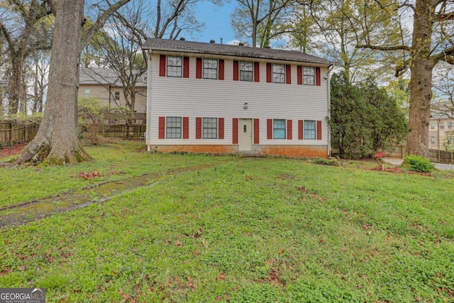 view of front of home featuring a front lawn