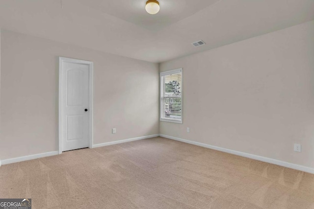 view of carpeted spare room