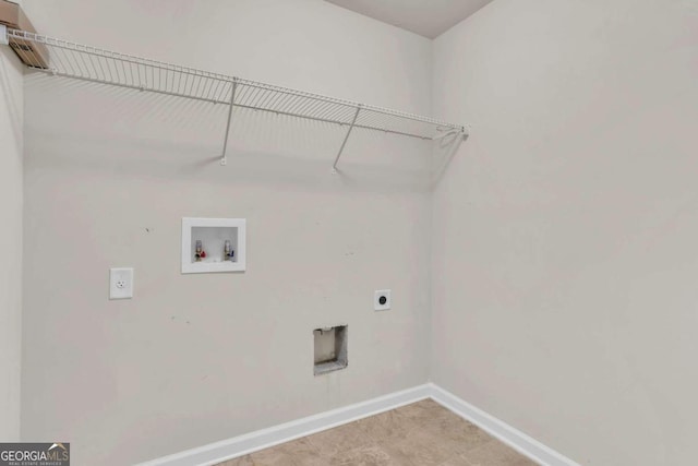 clothes washing area with electric dryer hookup and hookup for a washing machine