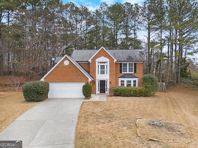 view of front of home with a garage