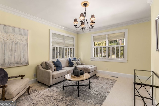 living room with ornamental molding and a chandelier