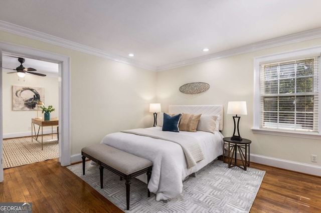 bedroom with ceiling fan, crown molding, and wood-type flooring