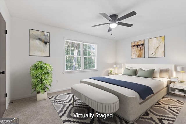 carpeted bedroom featuring ceiling fan