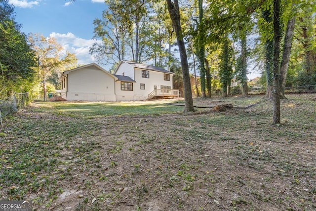 view of yard with a deck