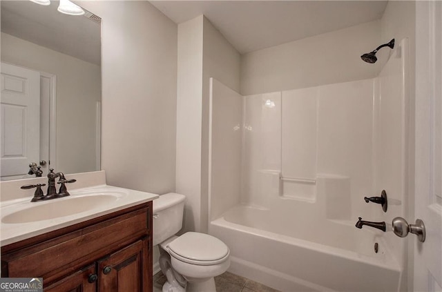 full bathroom featuring shower / bathing tub combination, vanity, tile patterned floors, and toilet