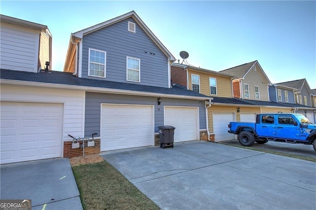 view of side of property featuring a garage