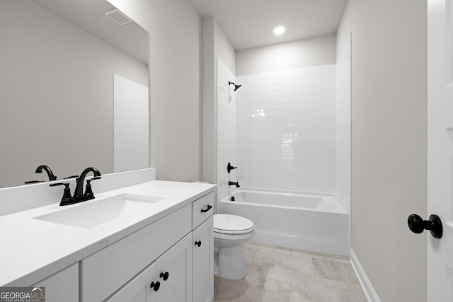 full bathroom with tiled shower / bath combo, vanity, and toilet