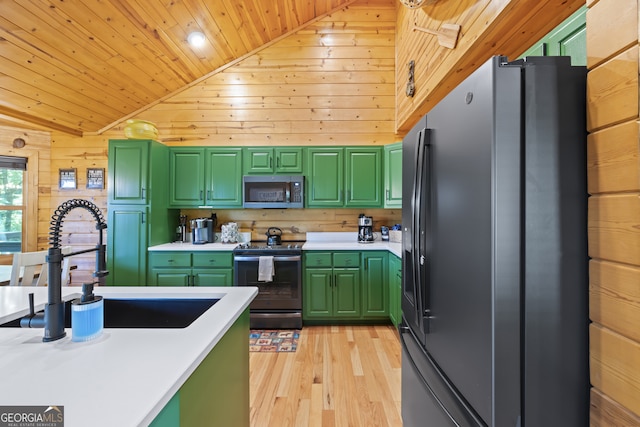 kitchen featuring green cabinetry and stainless steel appliances