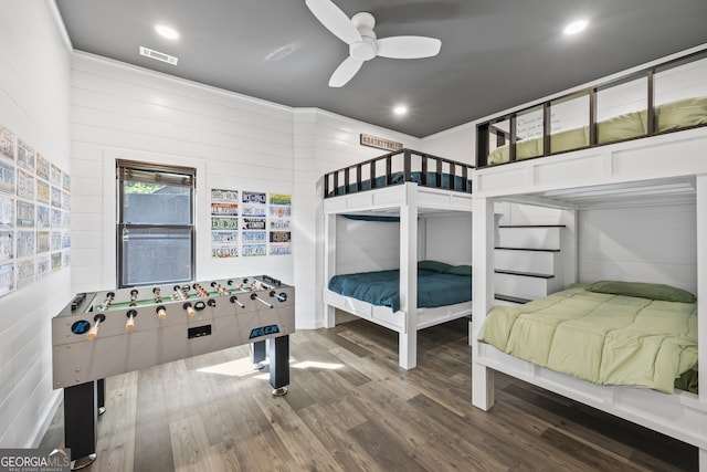 bedroom with hardwood / wood-style floors and ceiling fan