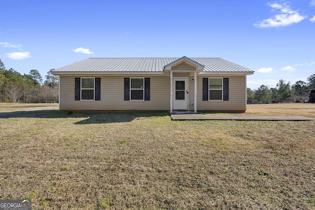 single story home with a front yard