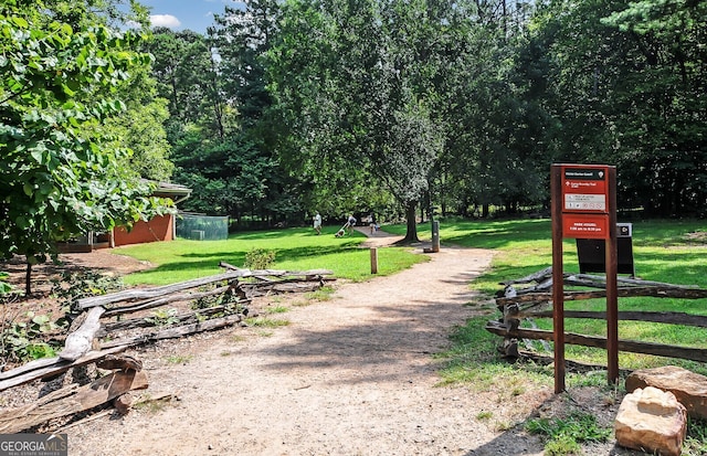 view of home's community with a lawn