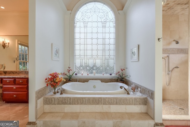 bathroom featuring vanity, shower with separate bathtub, and ornamental molding