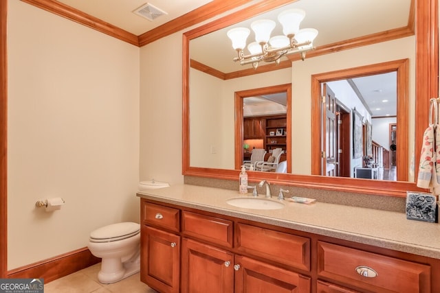 bathroom with toilet, tile patterned floors, ornamental molding, an inviting chandelier, and vanity