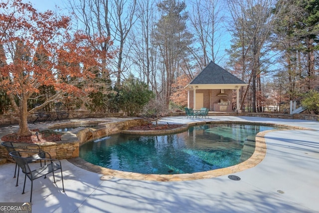 view of pool with a patio area and a gazebo